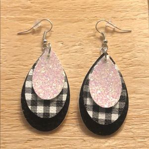 Handmade leather layered earrings.